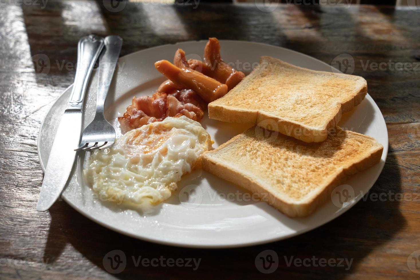 Homemade American Breakfast Served on Table in Morning photo