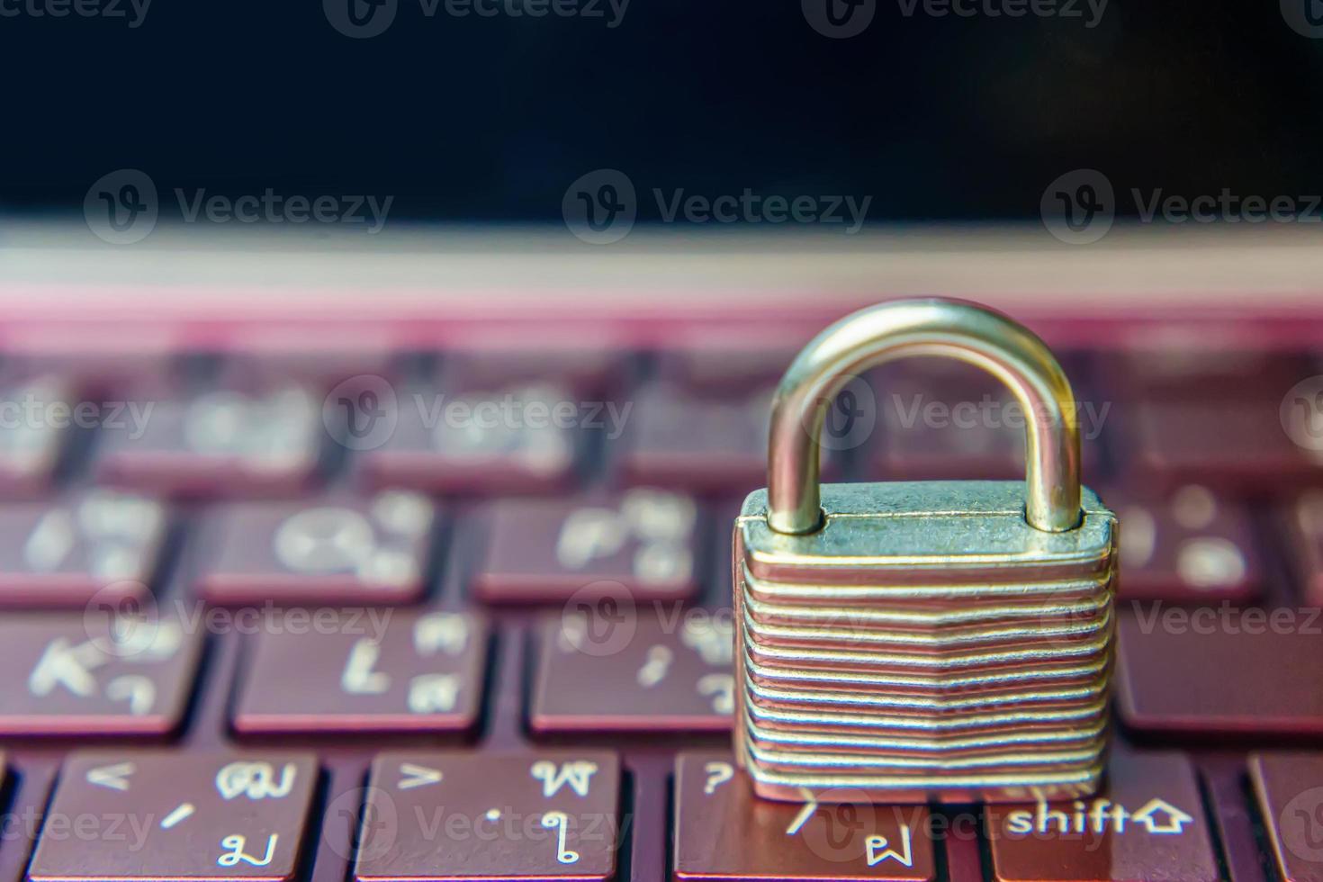 Padlock on keyboard laptop photo