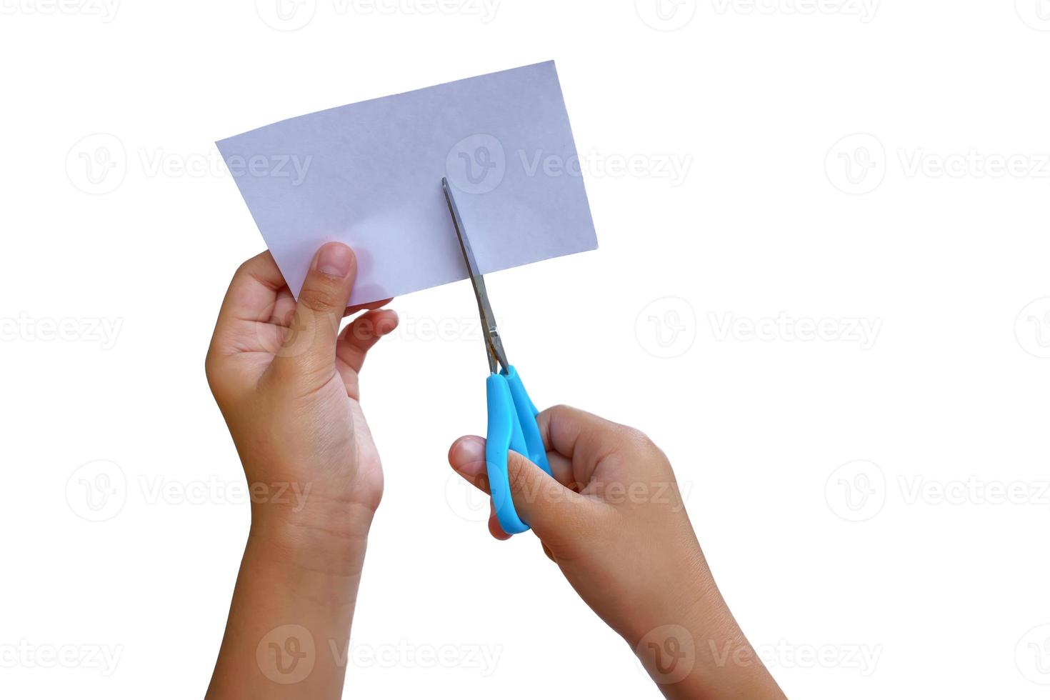 Girl is cutting paper photo