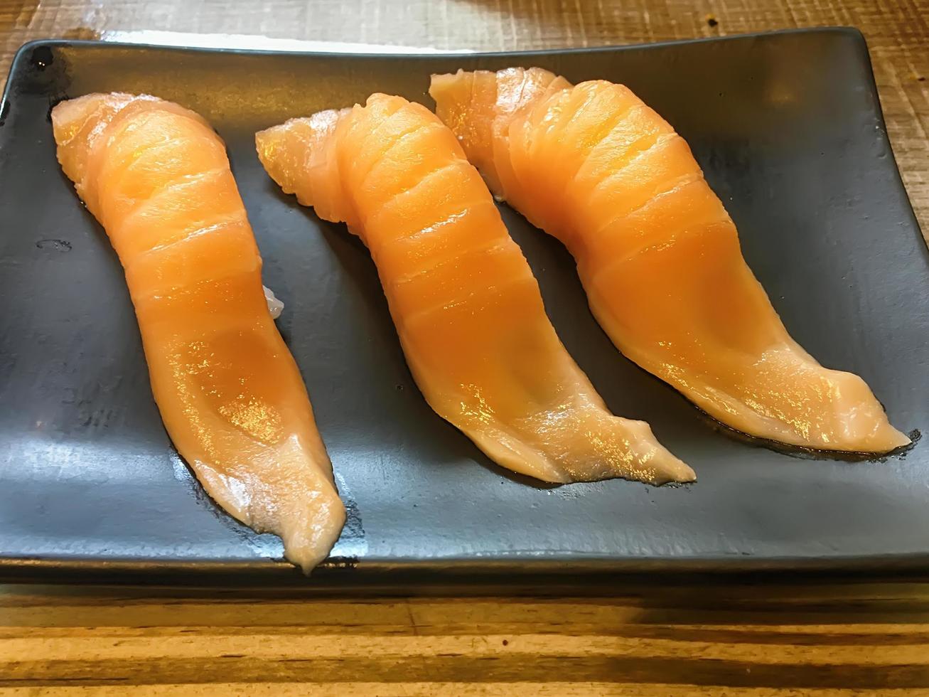 Sushi in the black plate photo