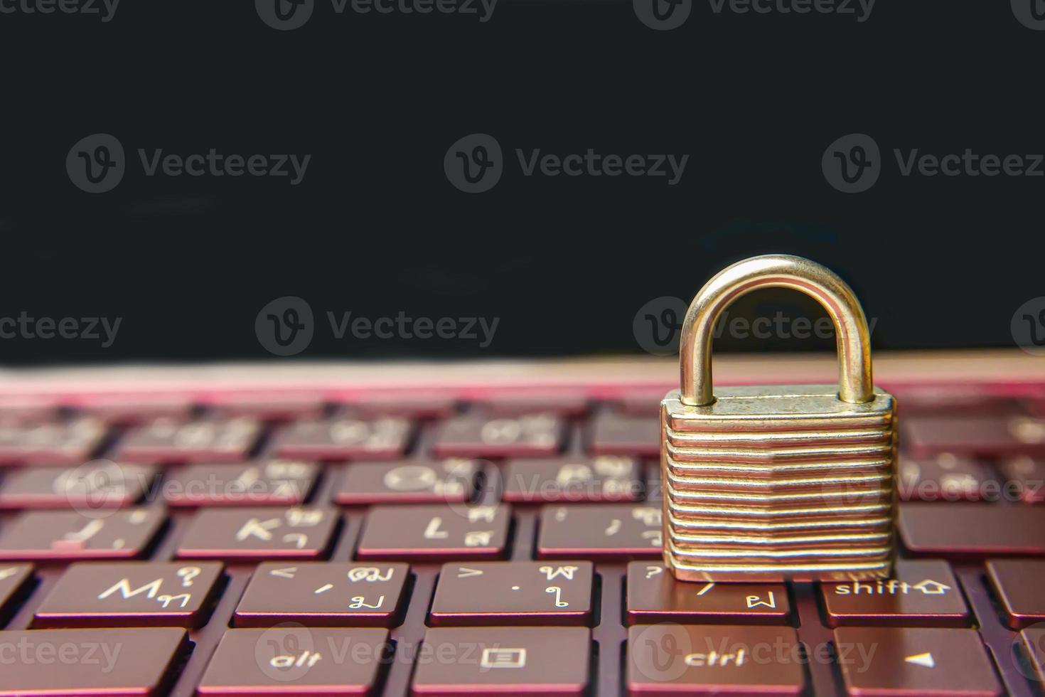 Padlock on keyboard laptop photo