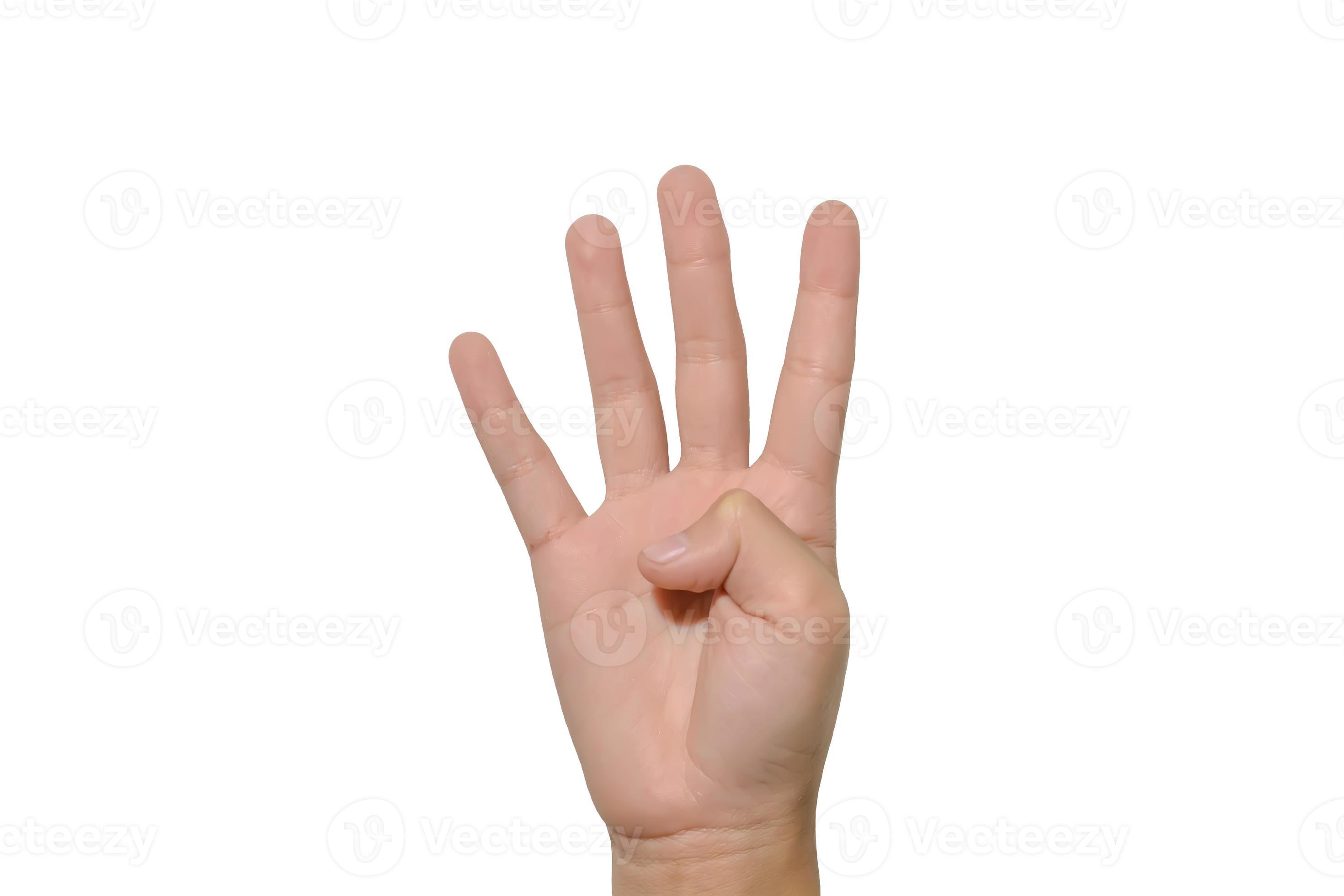 Boy raising four fingers up on hand on white background. 7988988 Stock