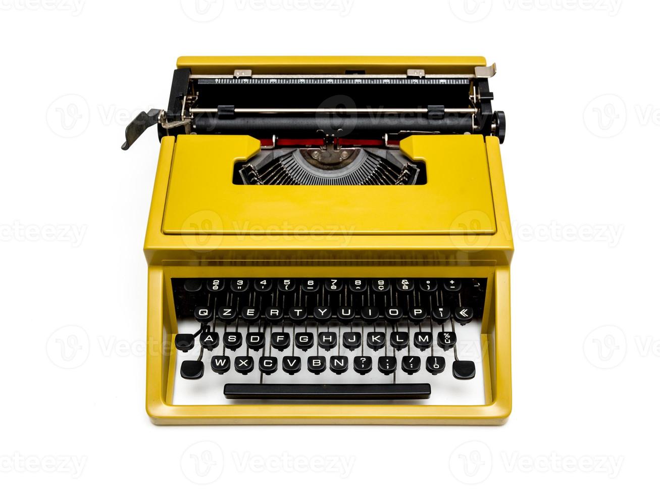 Vintage mustard yellow typewriter on a white background 7989140 Stock