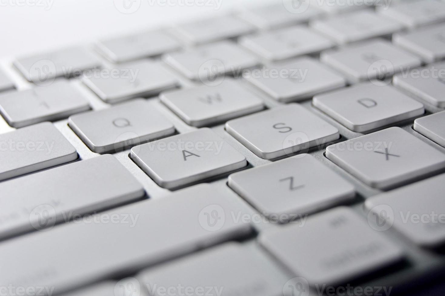 New computer keyboard with white keys. photo