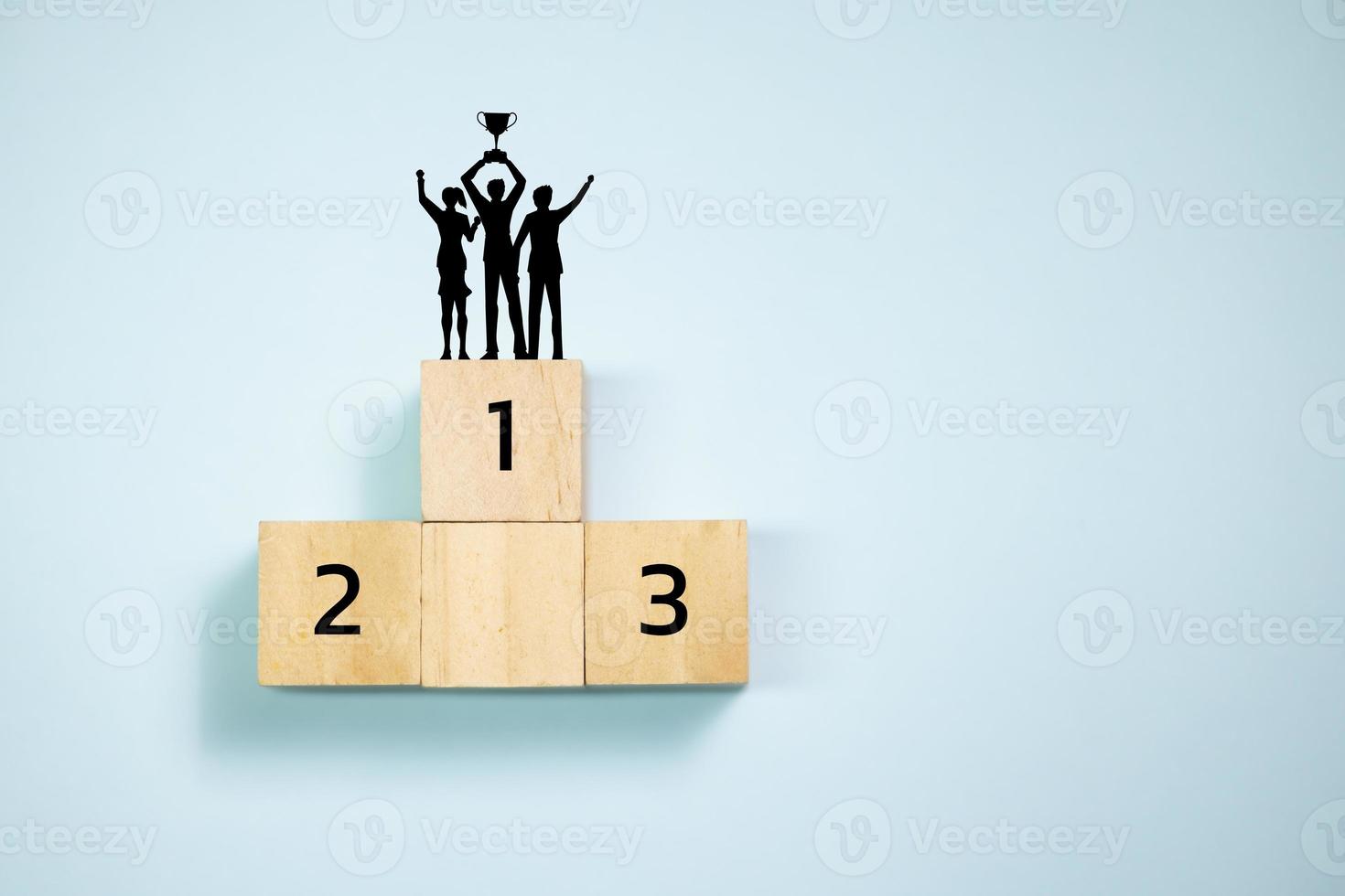 Top view people on top of wooden blocks  set  to podium. Concept for success and teamwork. photo