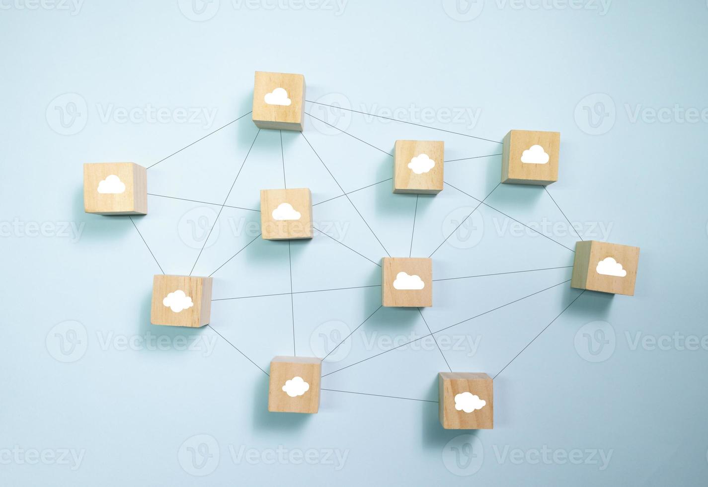 Top view wooden blocks with cloud icon set  to circle. Concept for cloud computing technology. photo