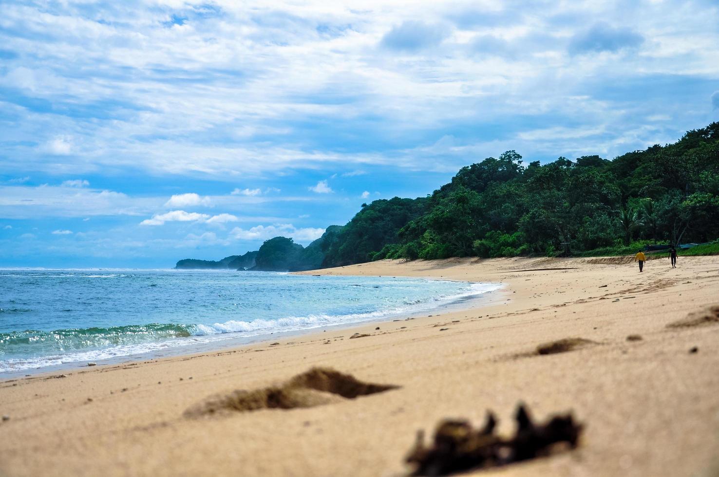 Panorama of long sand beach in the south of Malang city photo