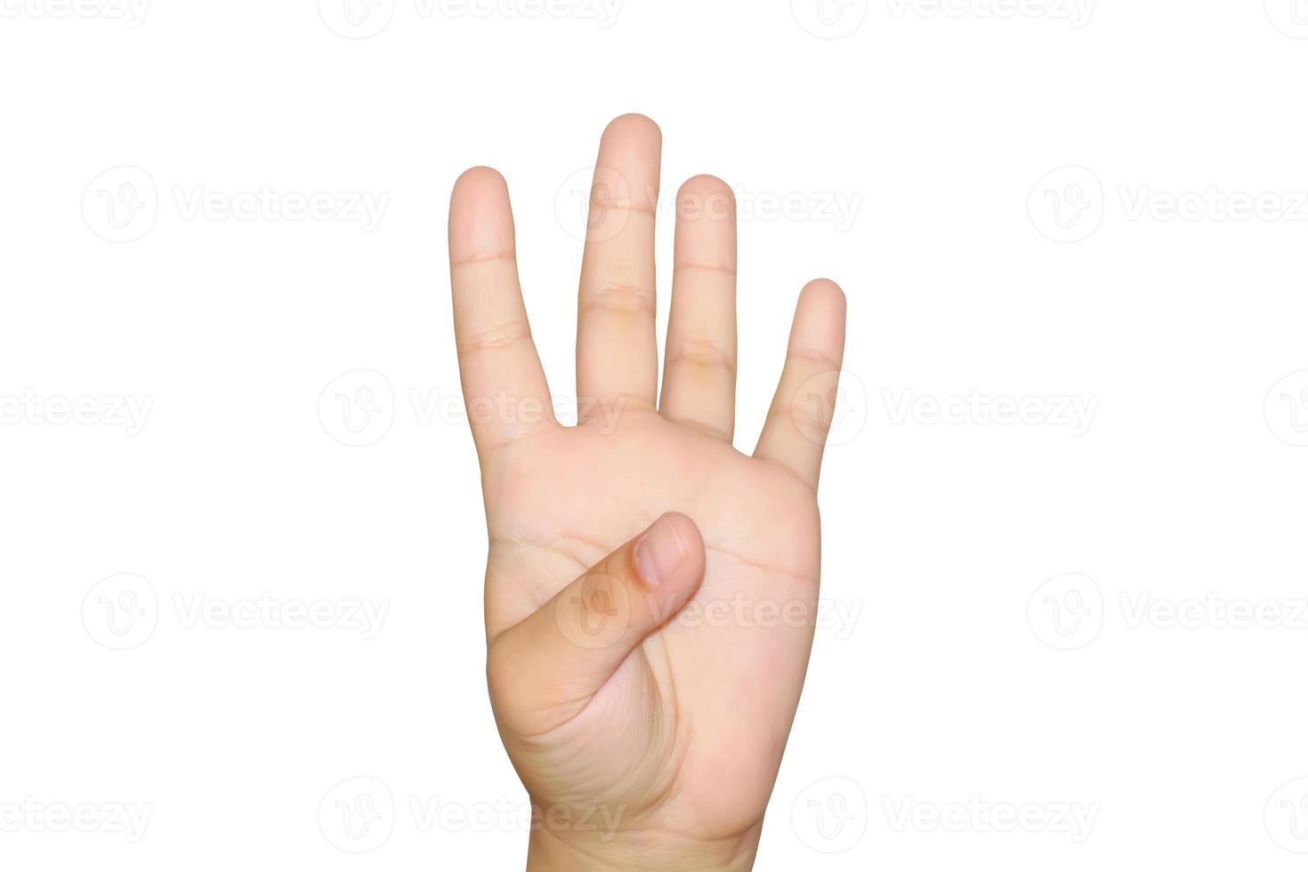 Girl showing four fingers on white background. photo