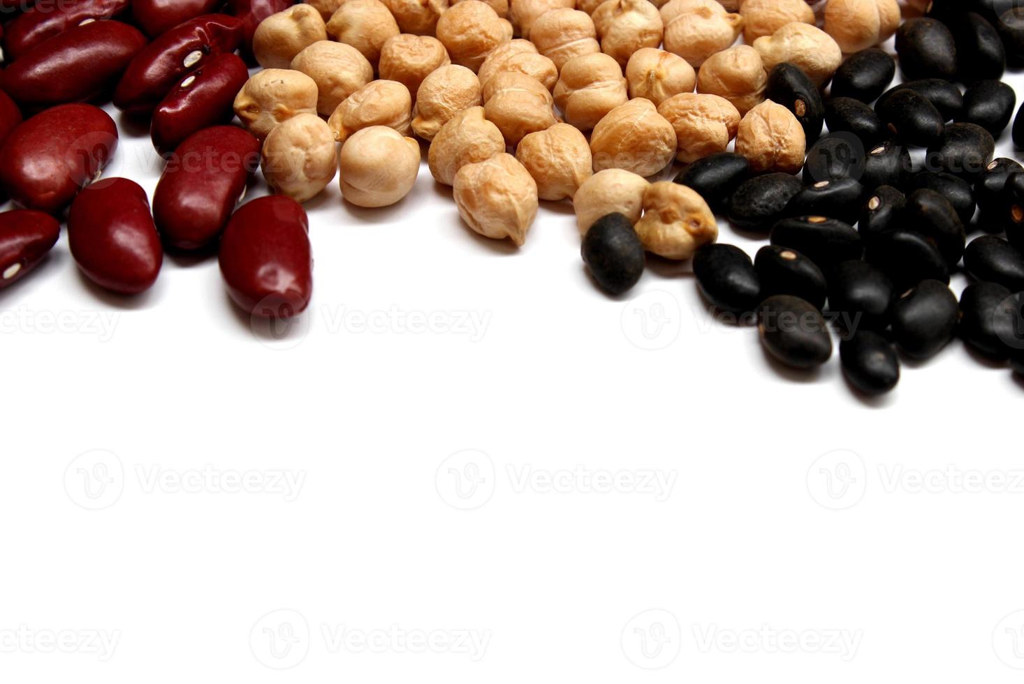 Red kidney bean, chickpea and black bean isolated on the white background photo