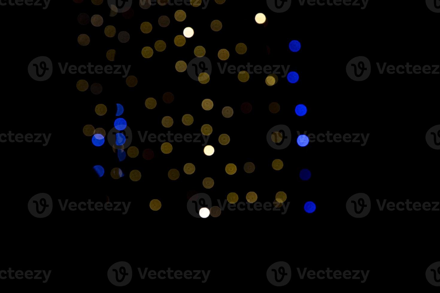 Black background with golden light effects. background with  Blur bokeh effects. Abstract background texture photo