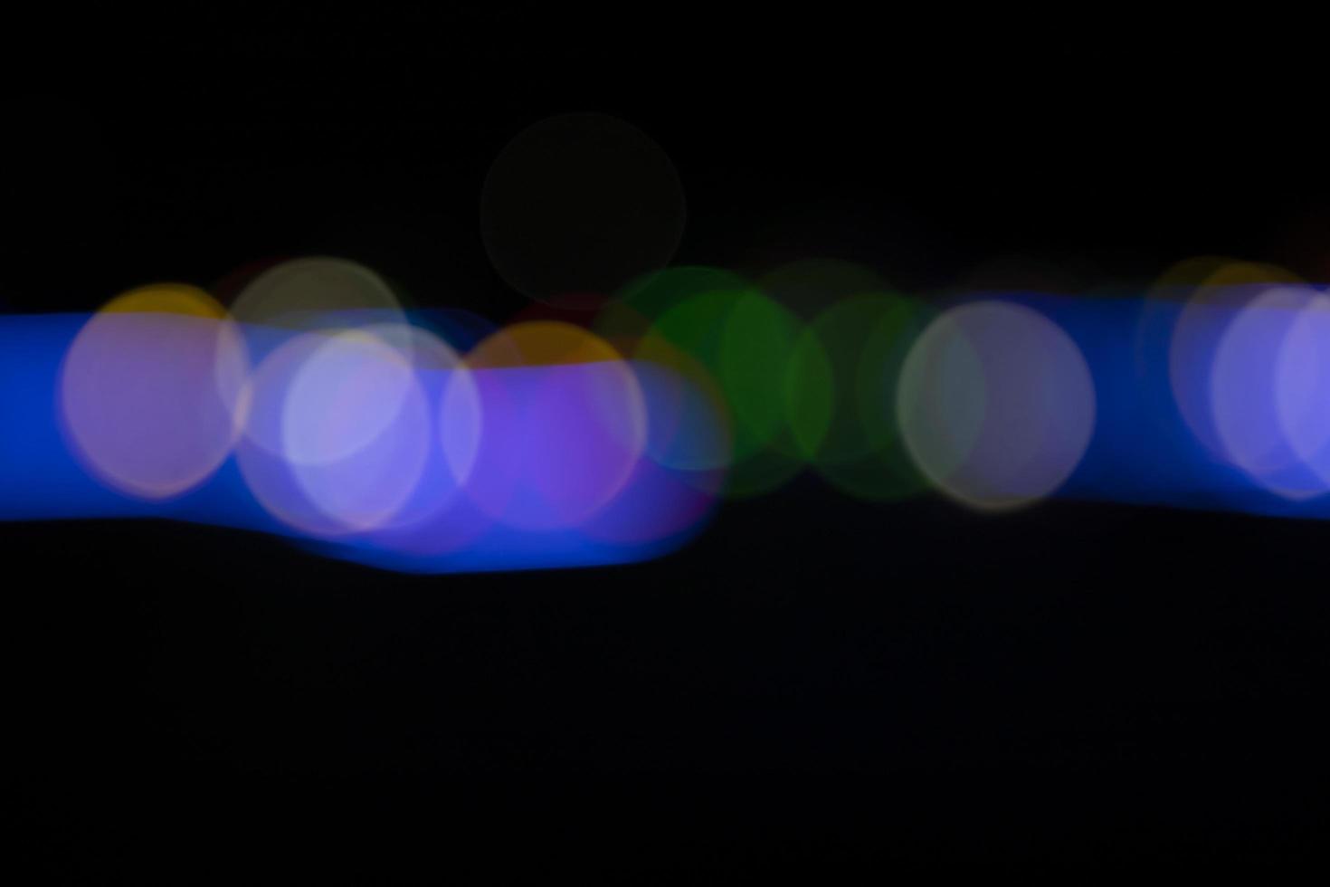 Black background with colorful light bokeh effects. background with  Blur bokeh effects. Abstract background texture photo