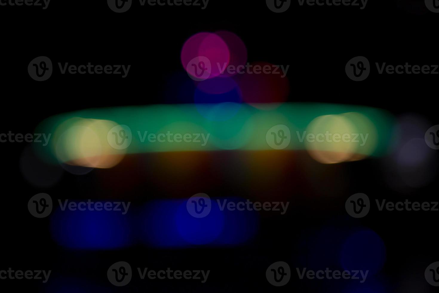 Abstract bokeh light effects on the night. Black background with colorful light effects. background with  Blur bokeh effects. Abstract background texture photo