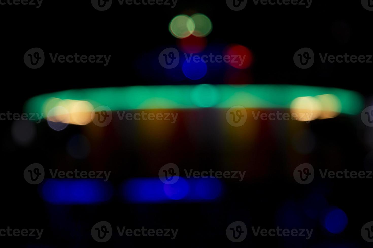 Abstract bokeh light effects on the night. Black background with colorful light effects. background with  Blur bokeh effects. Abstract background texture photo