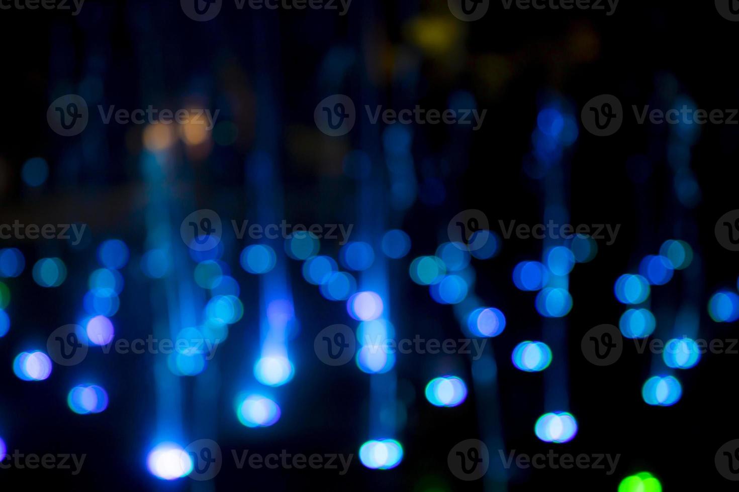 Abstract bokeh light effects on the night. Black background with colorful light effects. background with  Blur bokeh effects. Abstract background texture photo