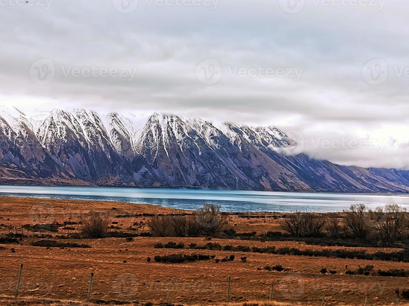 snowcapped mountains at Lake Tekapo photo