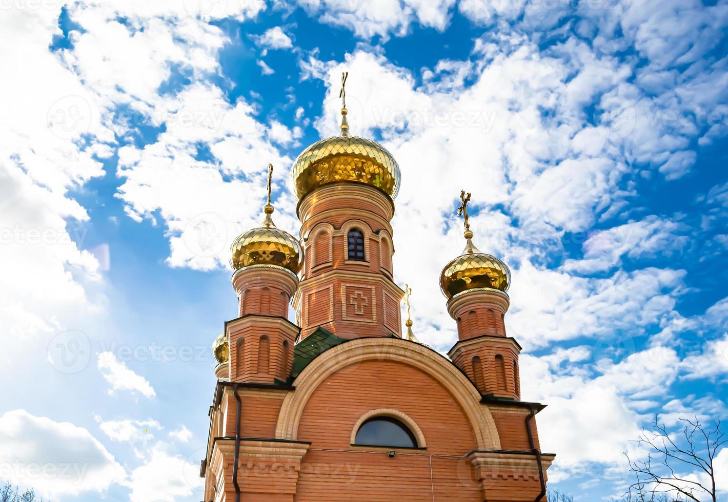 Christian church cross in high steeple tower for prayer photo