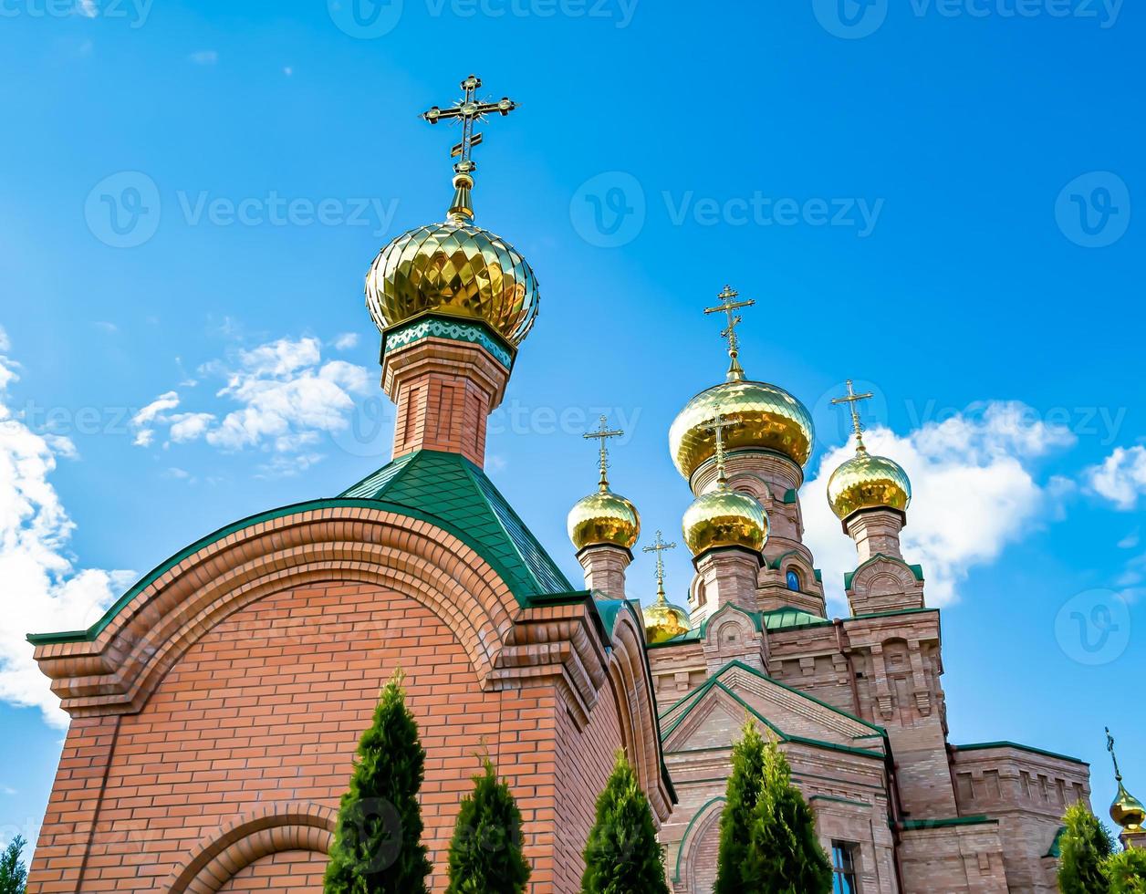 Christian church cross in high steeple tower for prayer photo