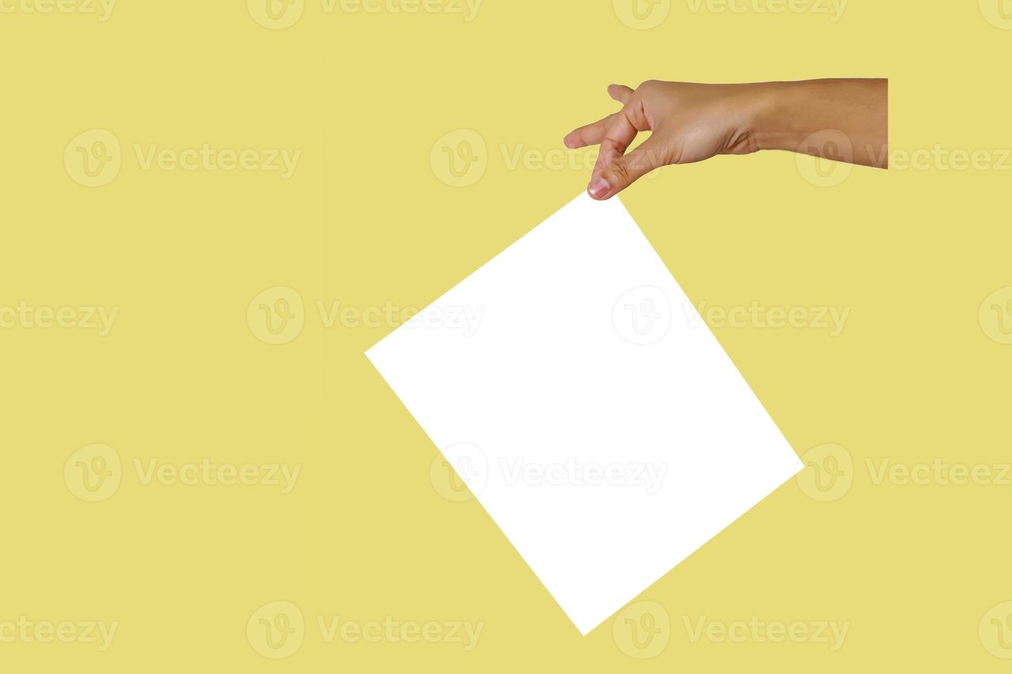 Hand are holding white paper photo