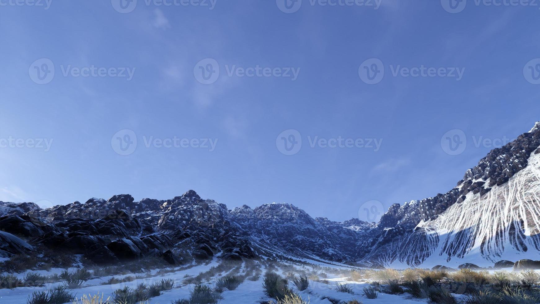 3D rendering landscape of winter snow covered mountains and huge rocks, clear skies. photo
