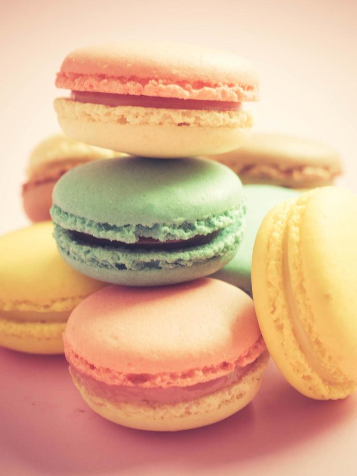 Colorful pastel macarons in vintage style. Sweet macarons with pastel colors. photo