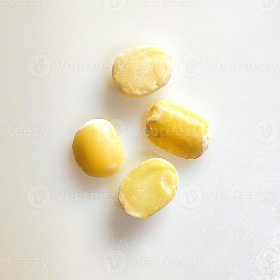 Macro shot of Urad Dal on white background. photo