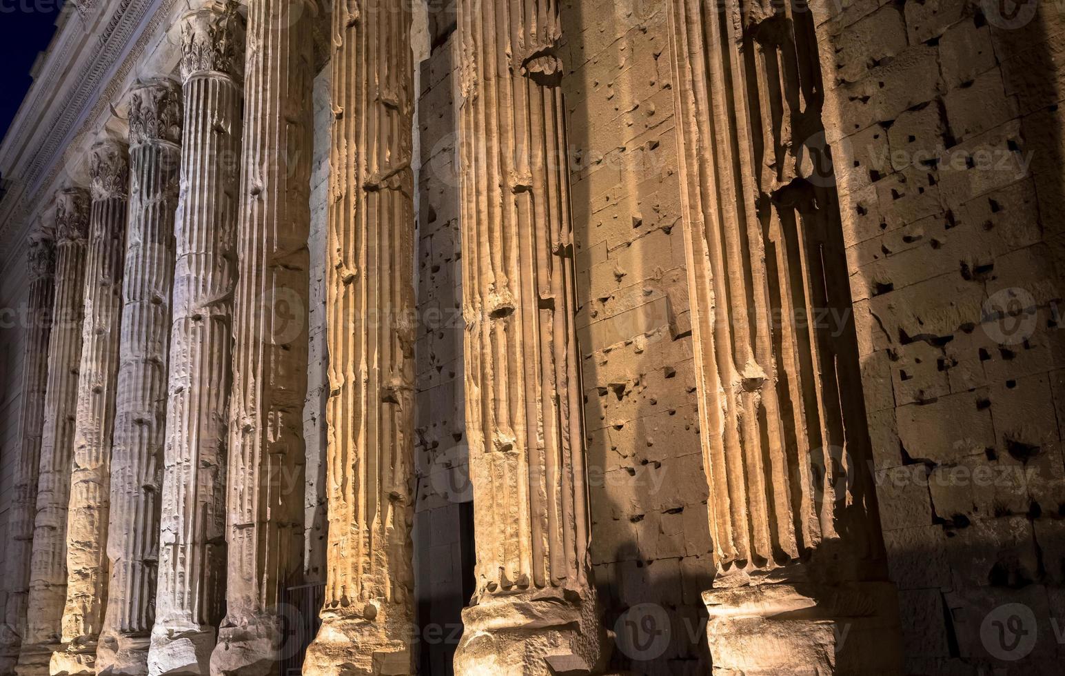 Detail of illuminated column architecture of Pantheon by night, Rome - Italy photo