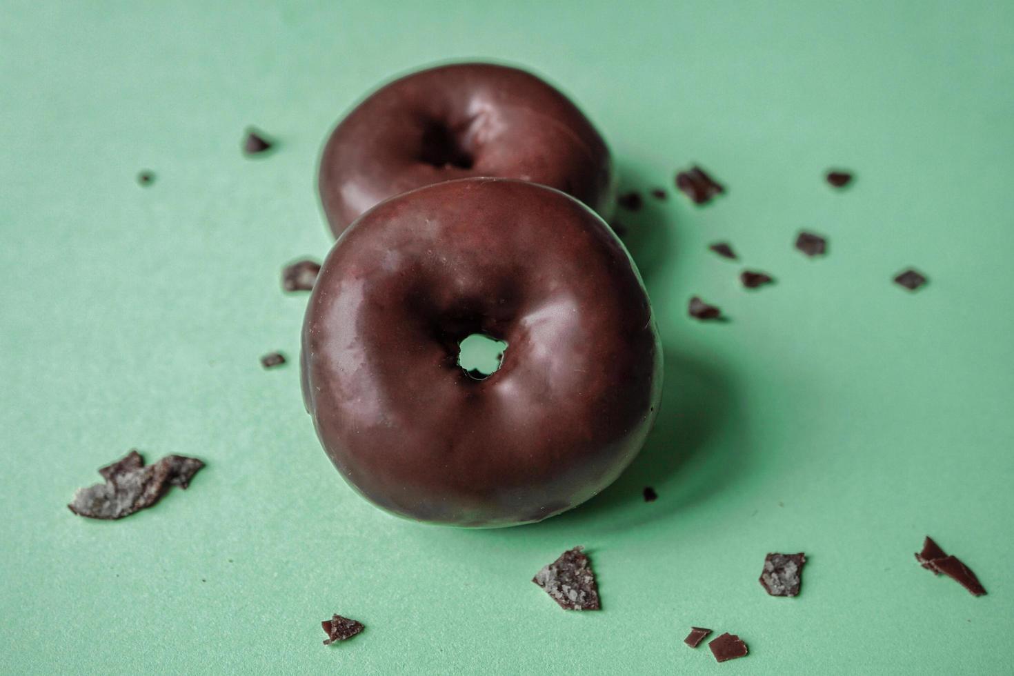 tasty chocolate donuts for breakfast, unhealthy food photo