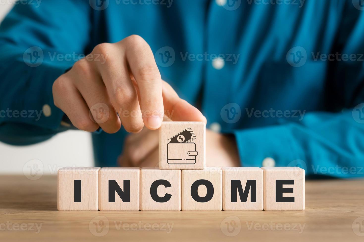 Wooden cube block with icon wallet, personal business monetization, successful business, profitable and financial success. photo