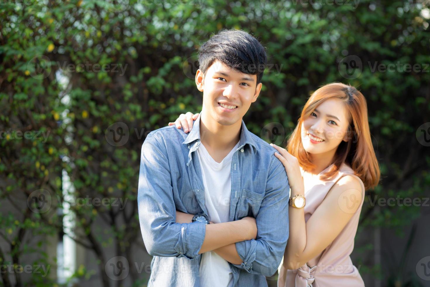 Beautiful portrait couple looking each others eyes and smiling with happy, young asian man and woman relation with love dating, husband and wife feeling and emotion, lovers and lifestyle concept. photo