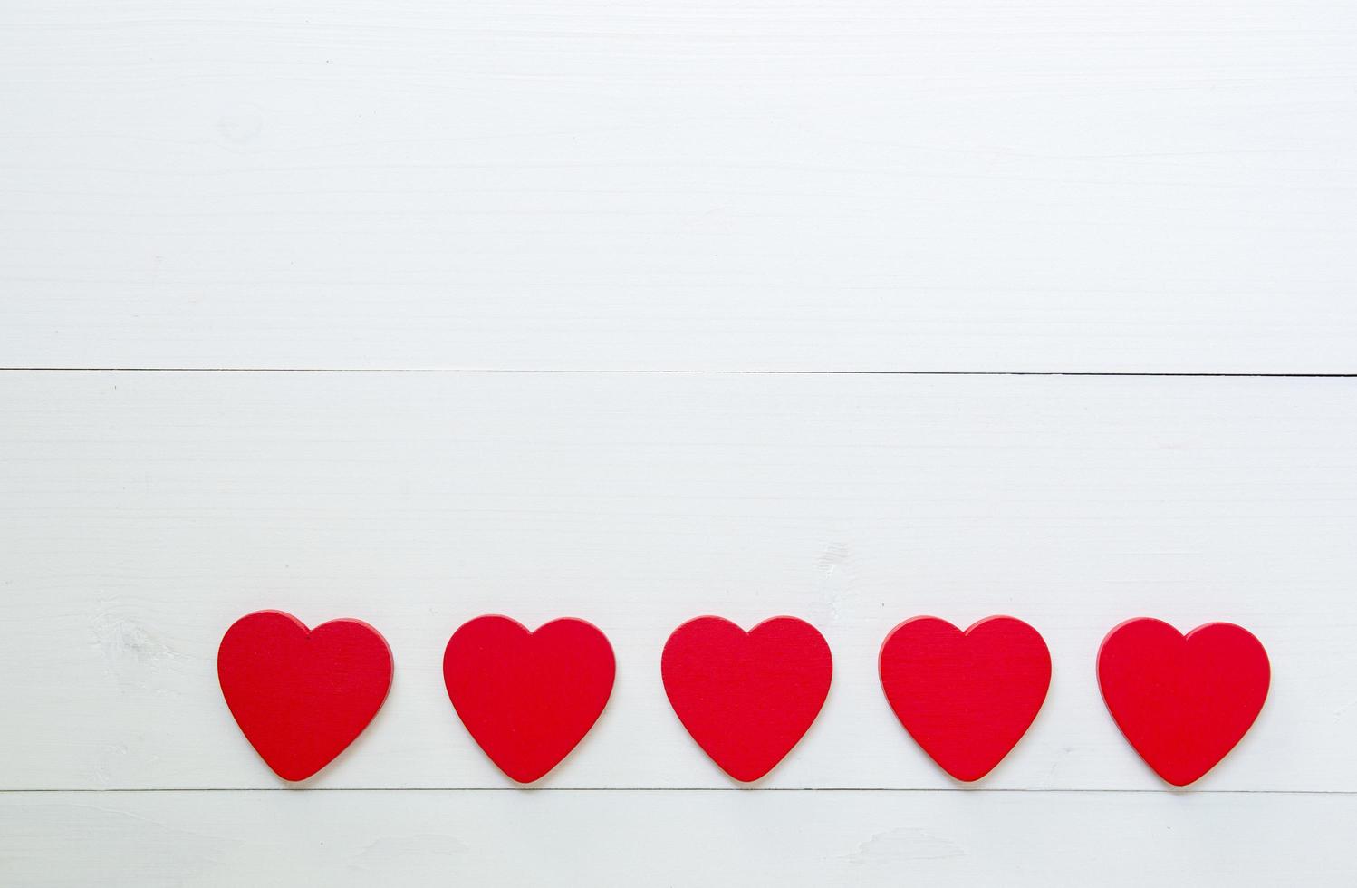 Red Heart with love on wooden background, 14 February Valentine day on grunge white wood, celebration and holiday concept, top view, copy space. photo