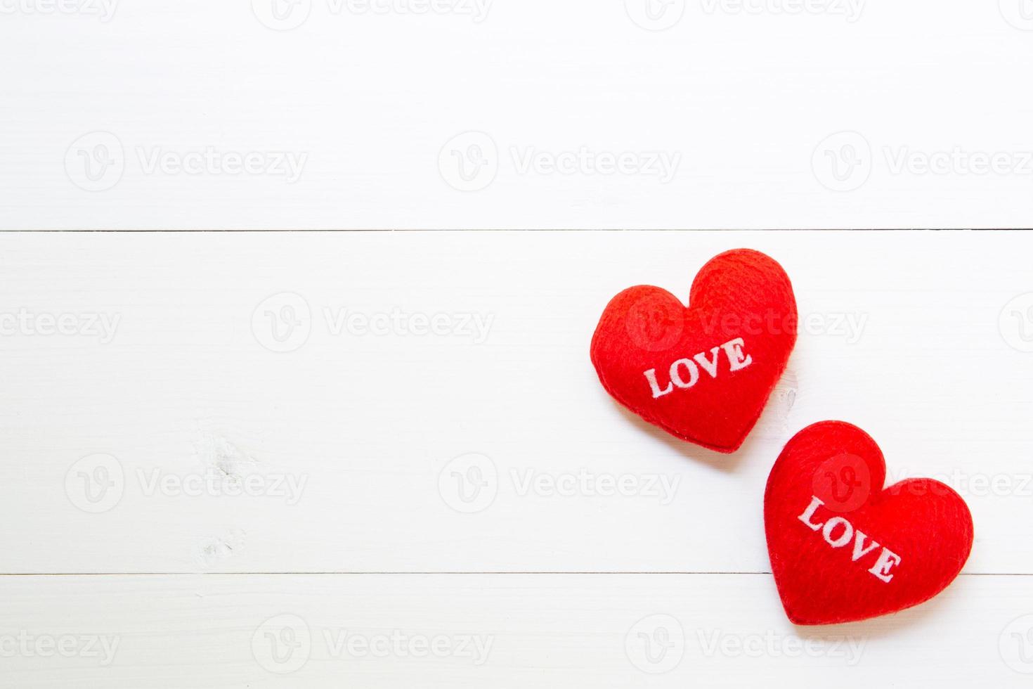 Red Heart with love on wooden background, 14 February Valentine day on wood, on grunge white wood, celebration and holiday concept, top view. photo