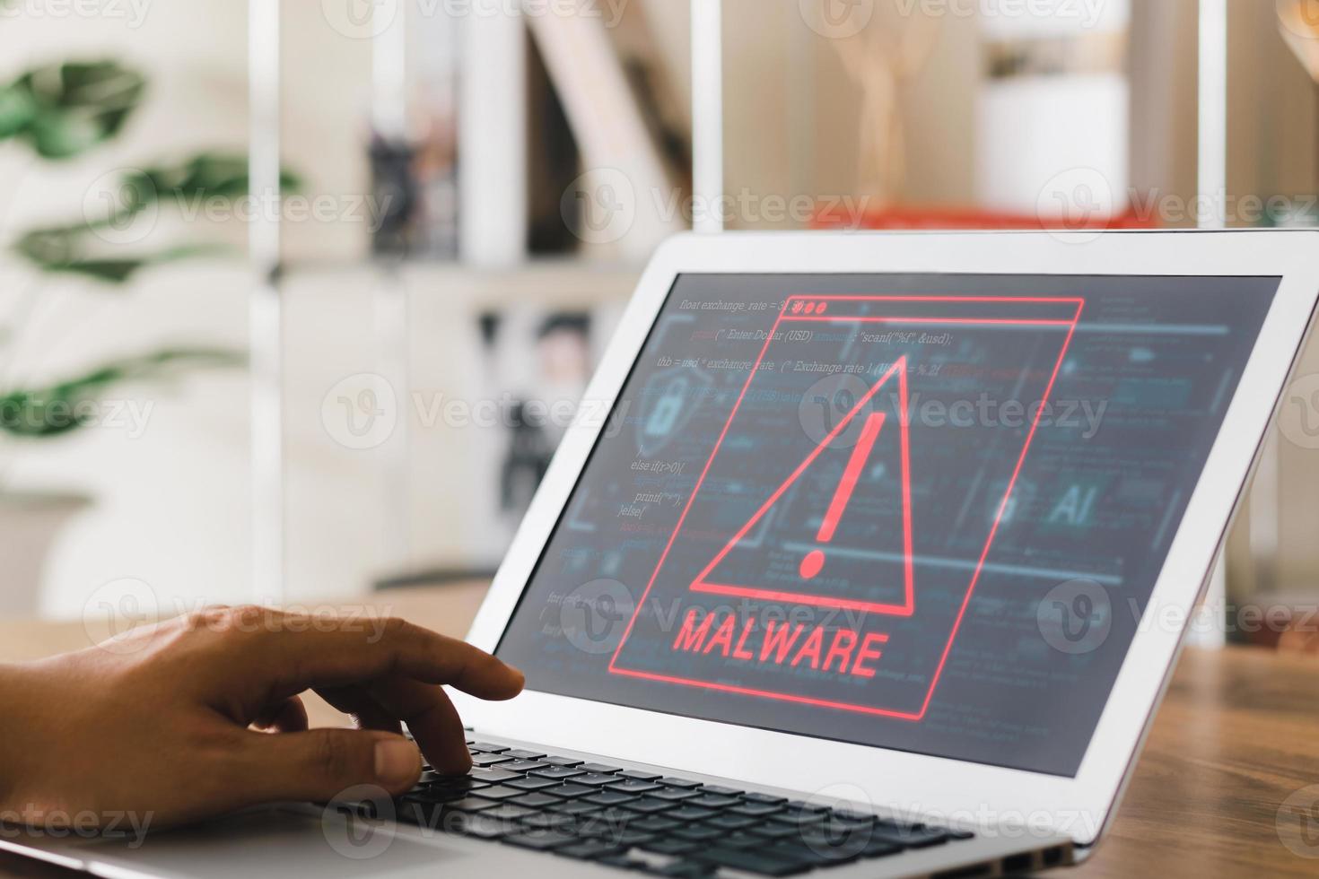 Concept of cyber crime and protection way, laptop showing malware and virus screen, hacking passwords and personal data. photo