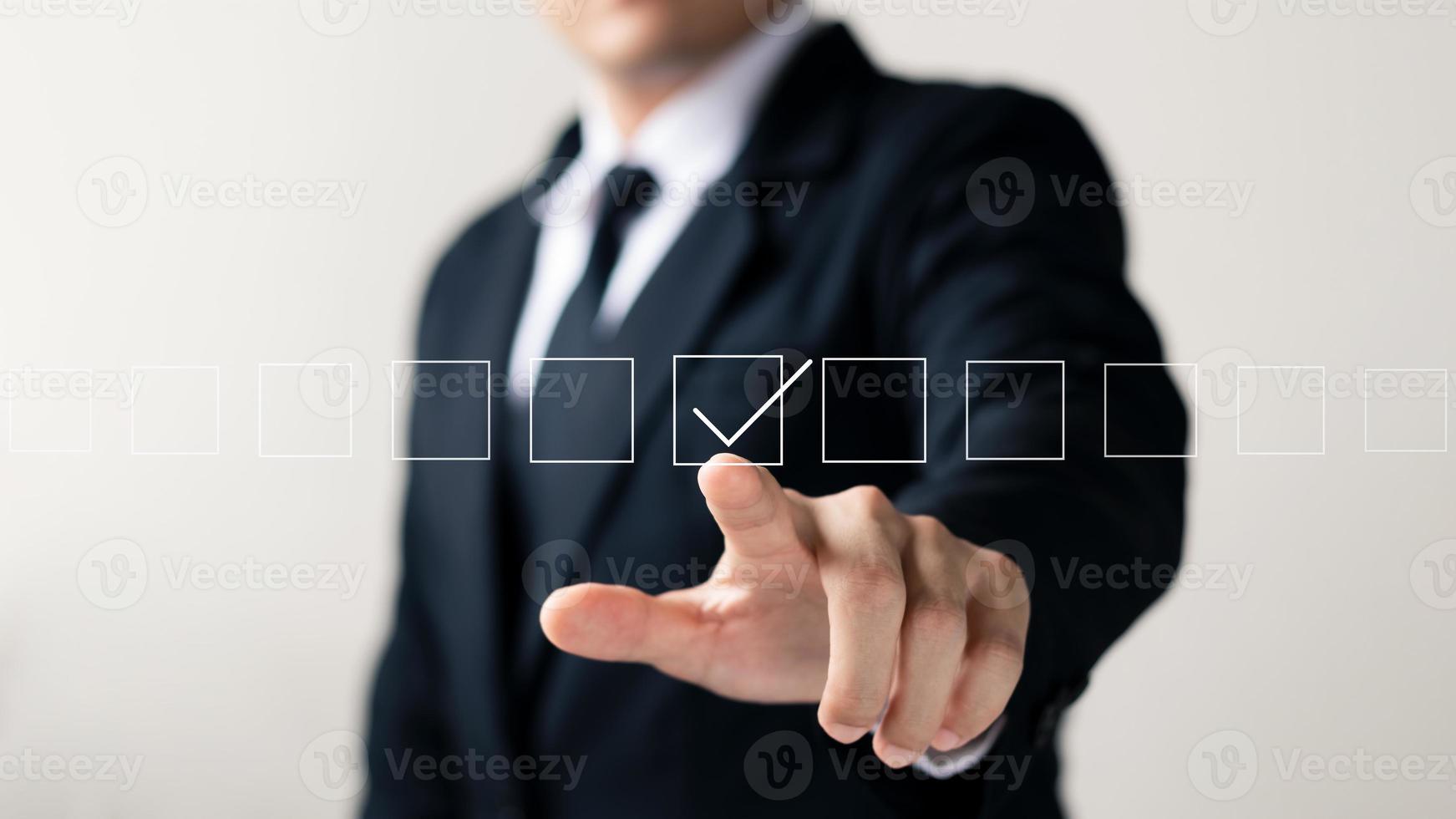 Businessman touching squares with the right meaning, business concept. photo