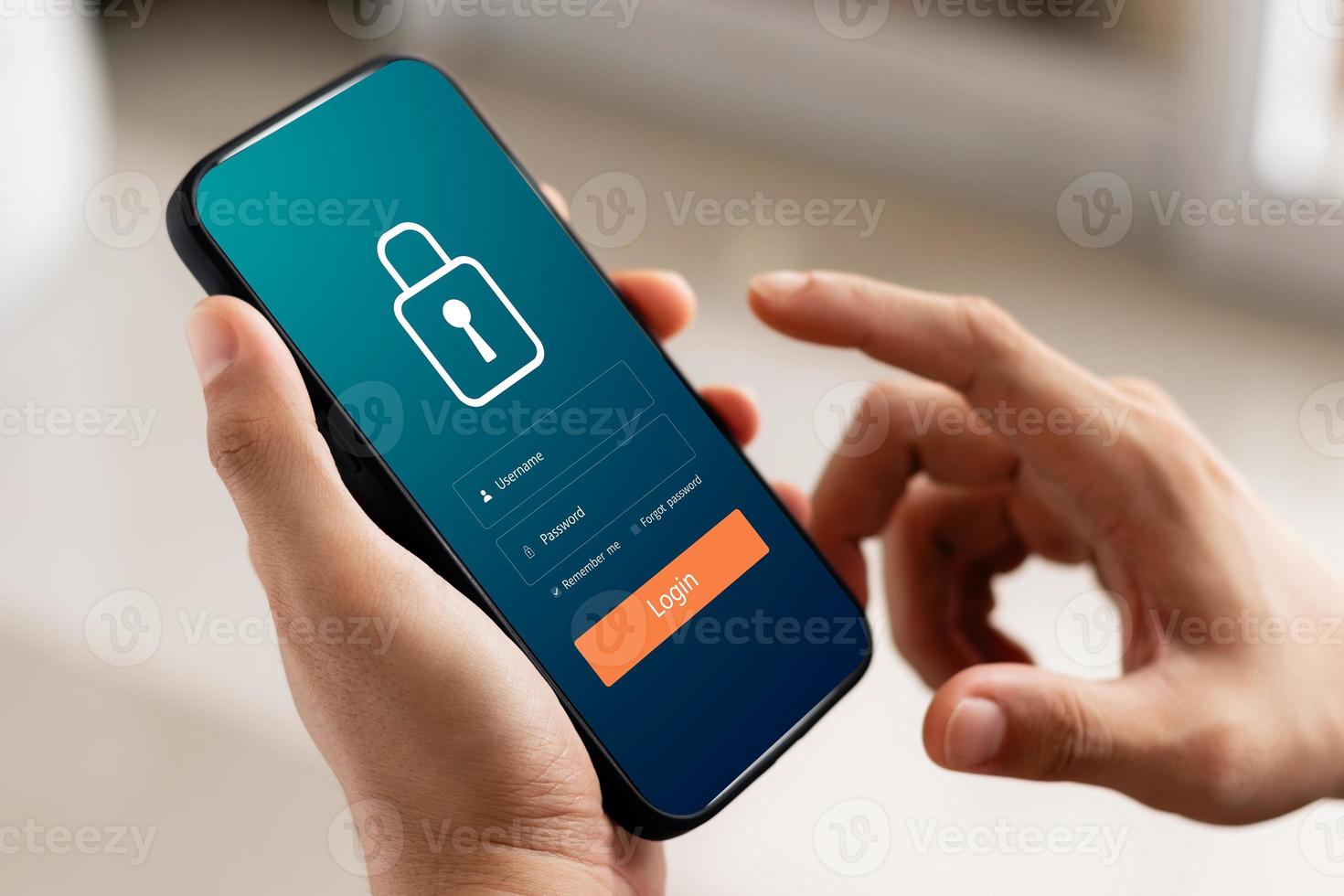 Cybersecurity internet and networking concept. Close up of hand holding smartphone information security and encryption, secure access to user's personal information, secure Internet access. photo