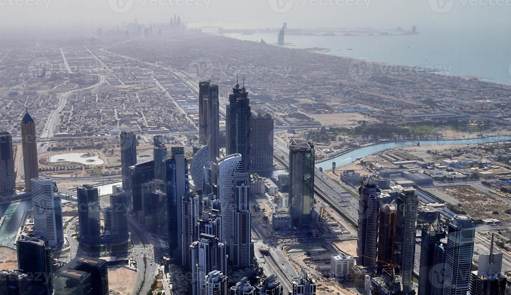 Aerial view over the city center of dubai on a sunny day photo