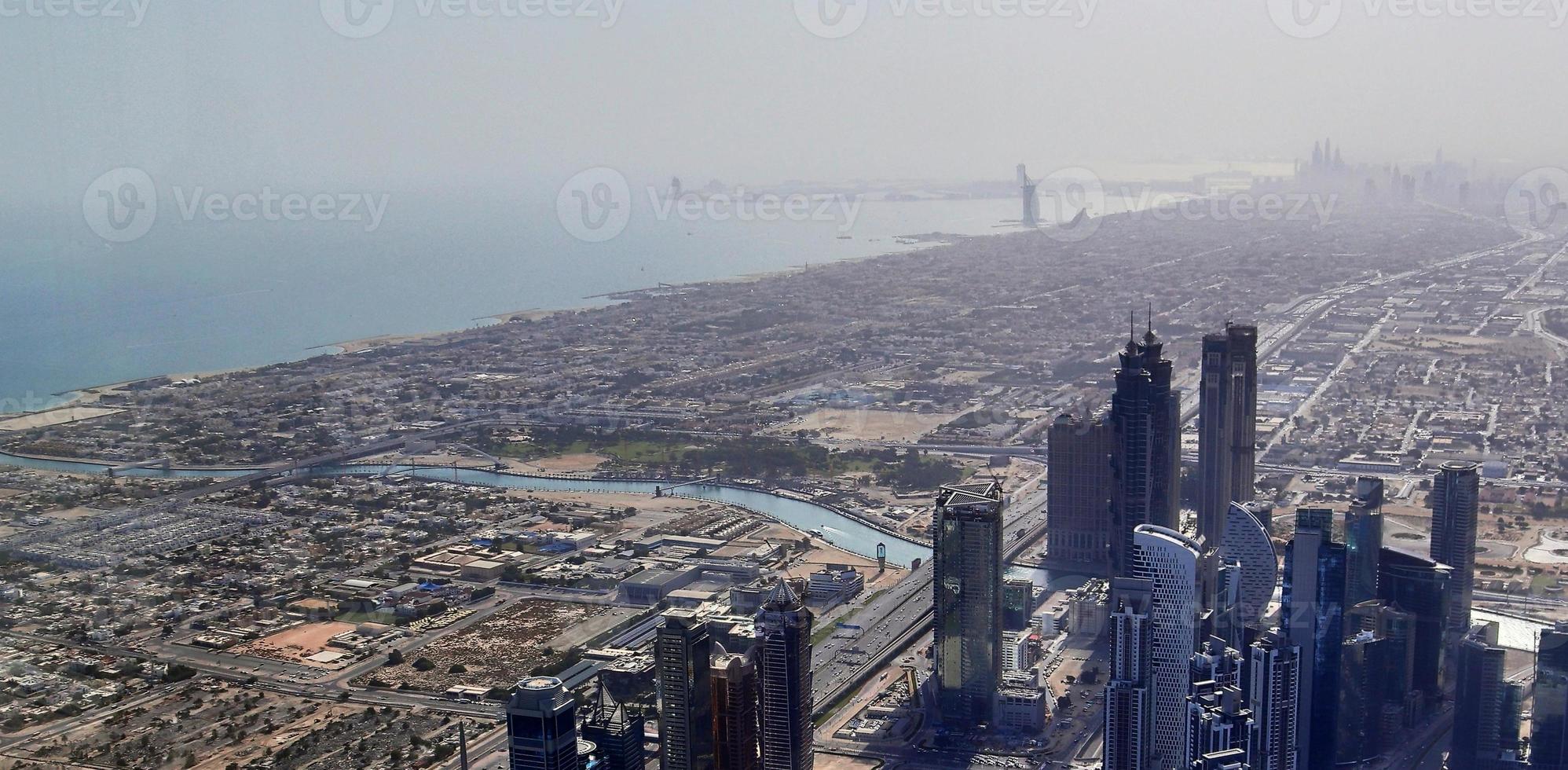 Aerial view over the city center of dubai on a sunny day photo