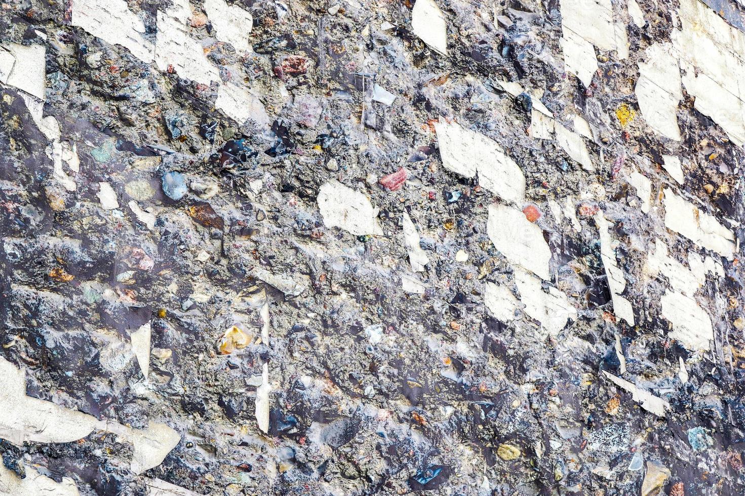 Detailed view on aged concrete walls with cracks and a lot of structure in high resolution photo