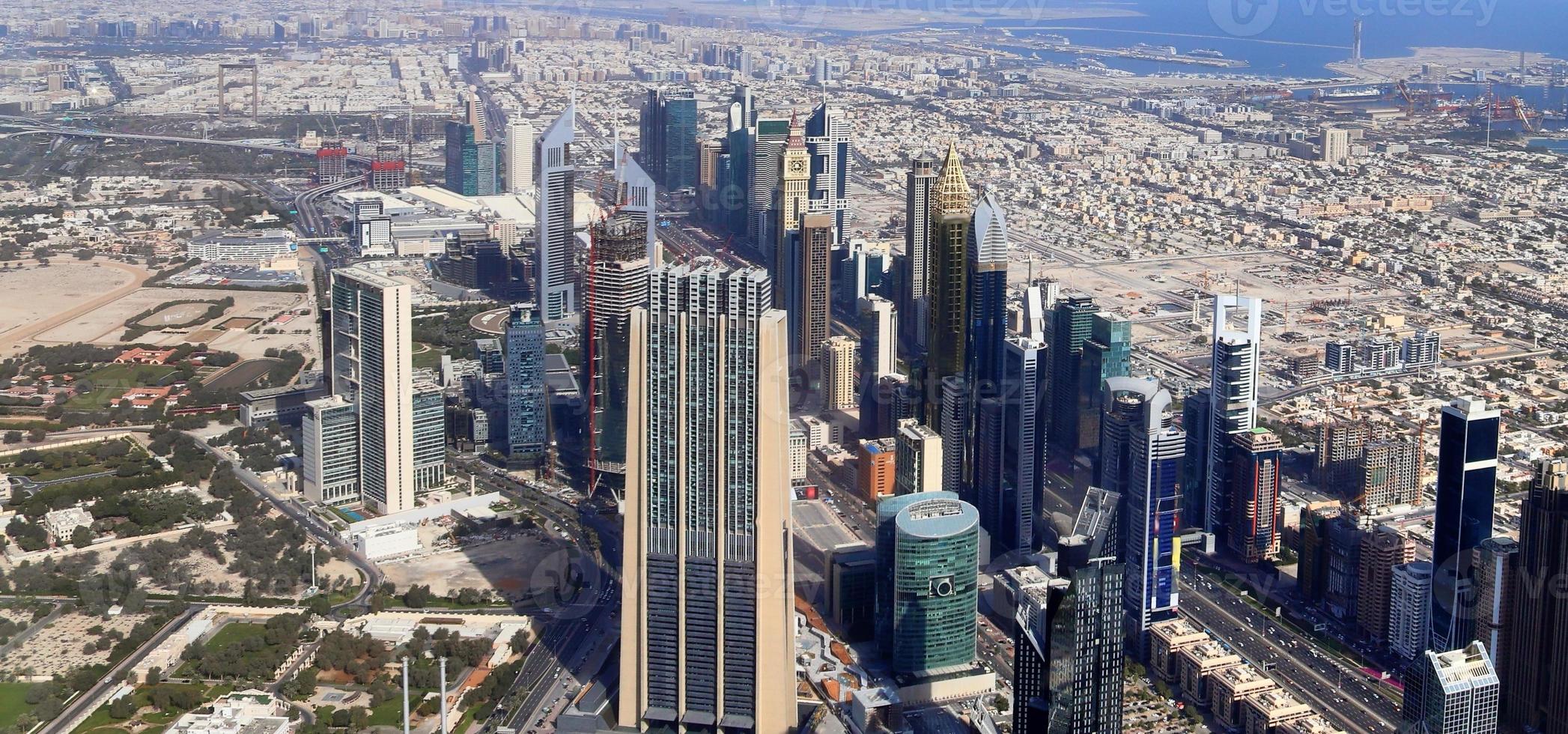 Aerial view over the city center of dubai on a sunny day photo