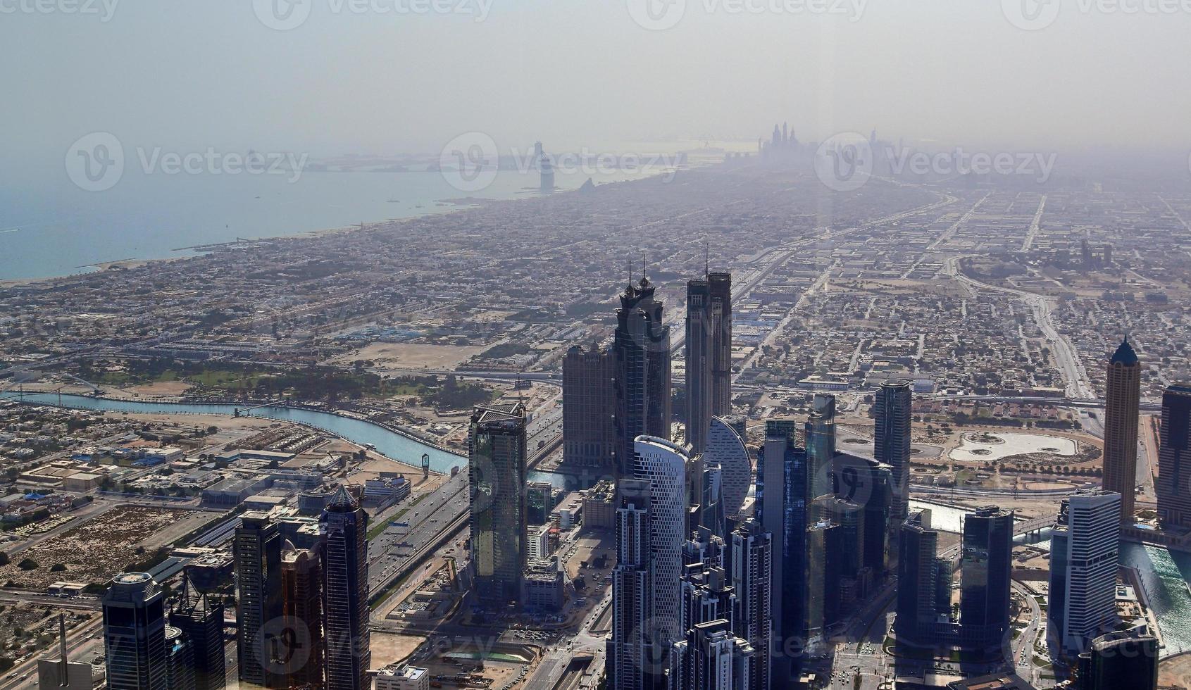 Aerial view over the city center of dubai on a sunny day photo