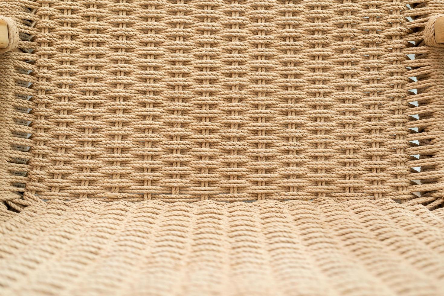 Closeup of wood chair with rattan, Beautiful oak wood texture surface , rattan pattern. photo