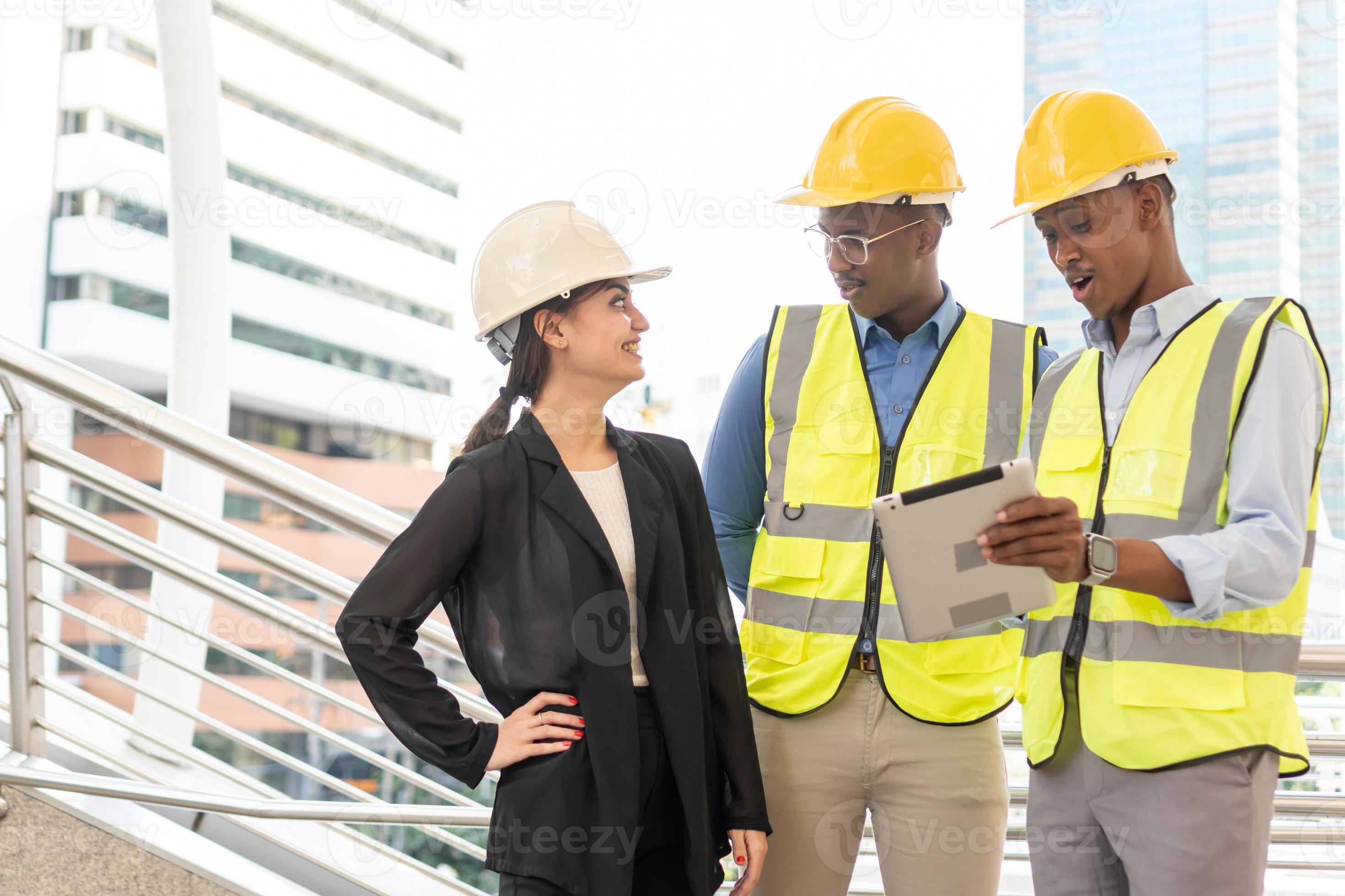 Group of Engineer Worker Wearing Safety Uniform and Hard Hat Uses
