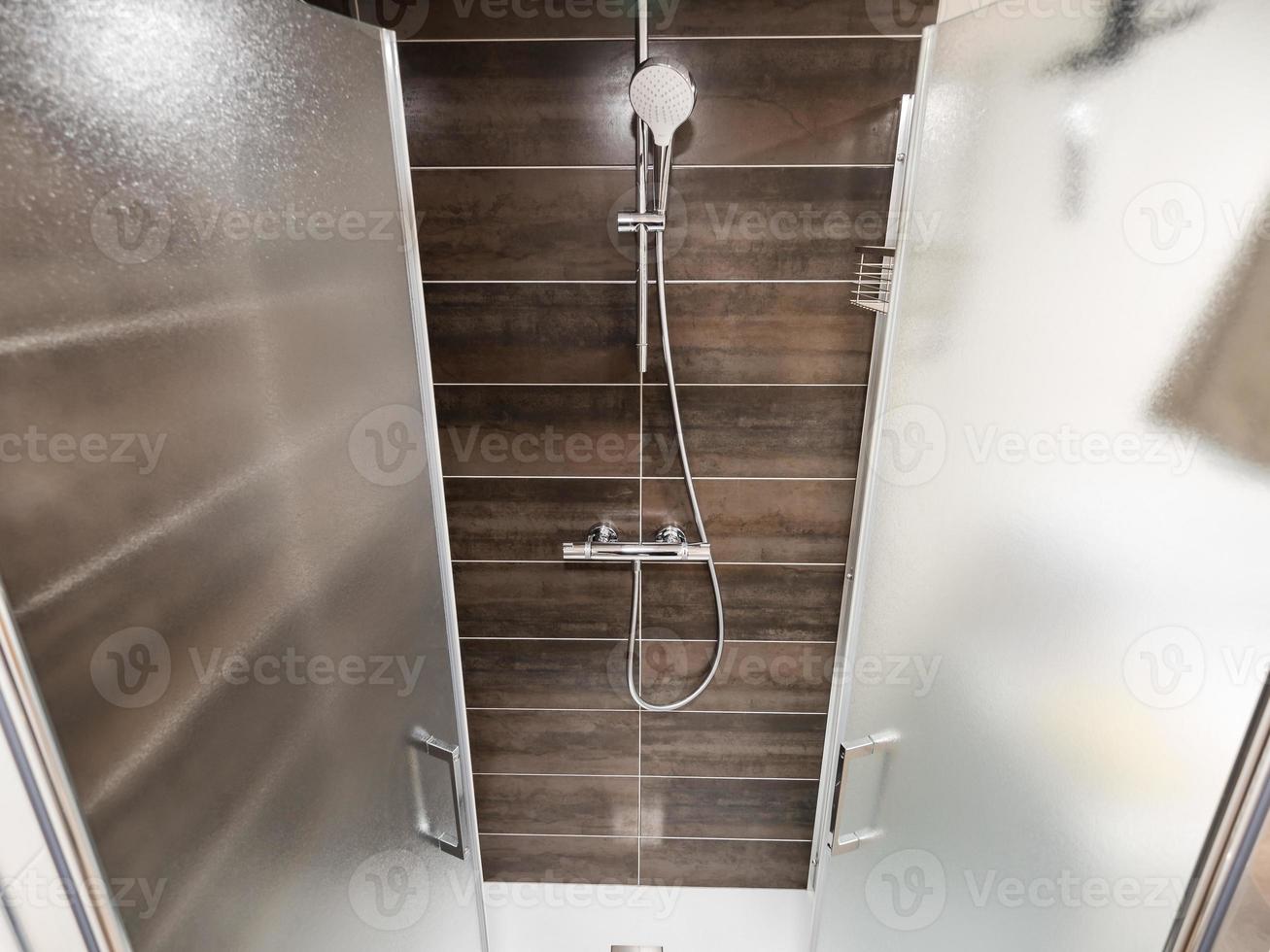 New shower cabin after renovation. Purity and freshness. photo