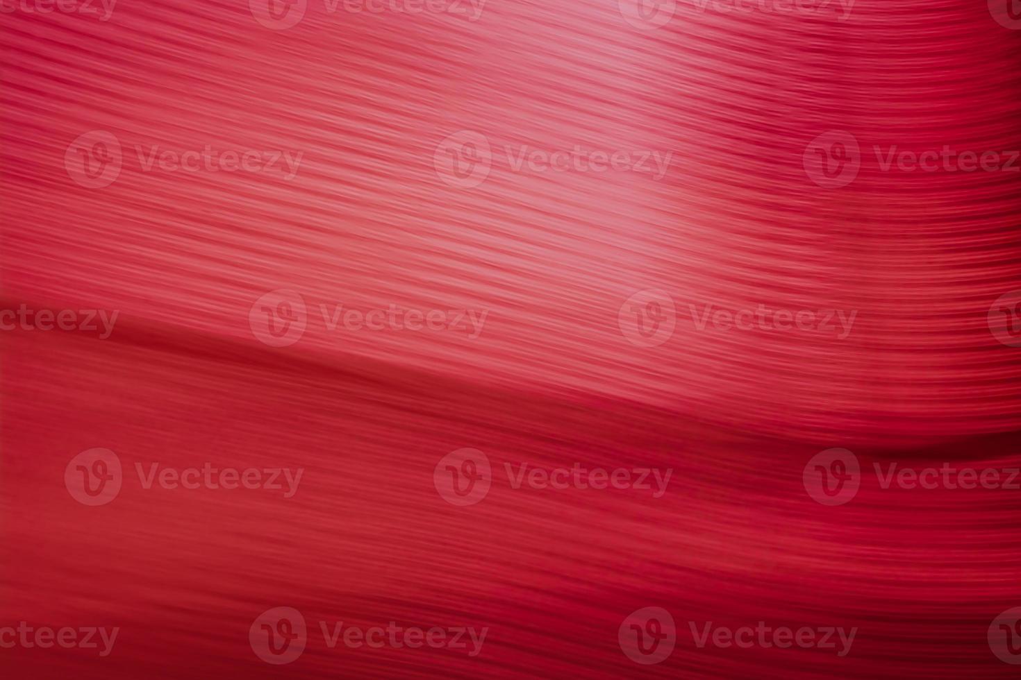 Red abstract background with small stripes. photo