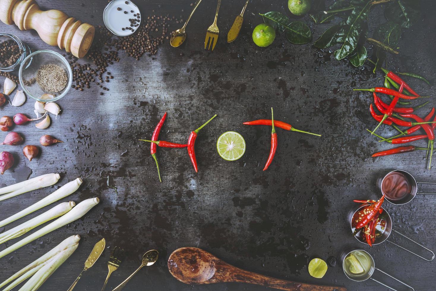 Spices for use as cooking ingredients on a wooden background with Fresh vegetables. Healthy food herbs. Organic vegetables on the table. Raw materials of cooking preparation Tom Yum. photo