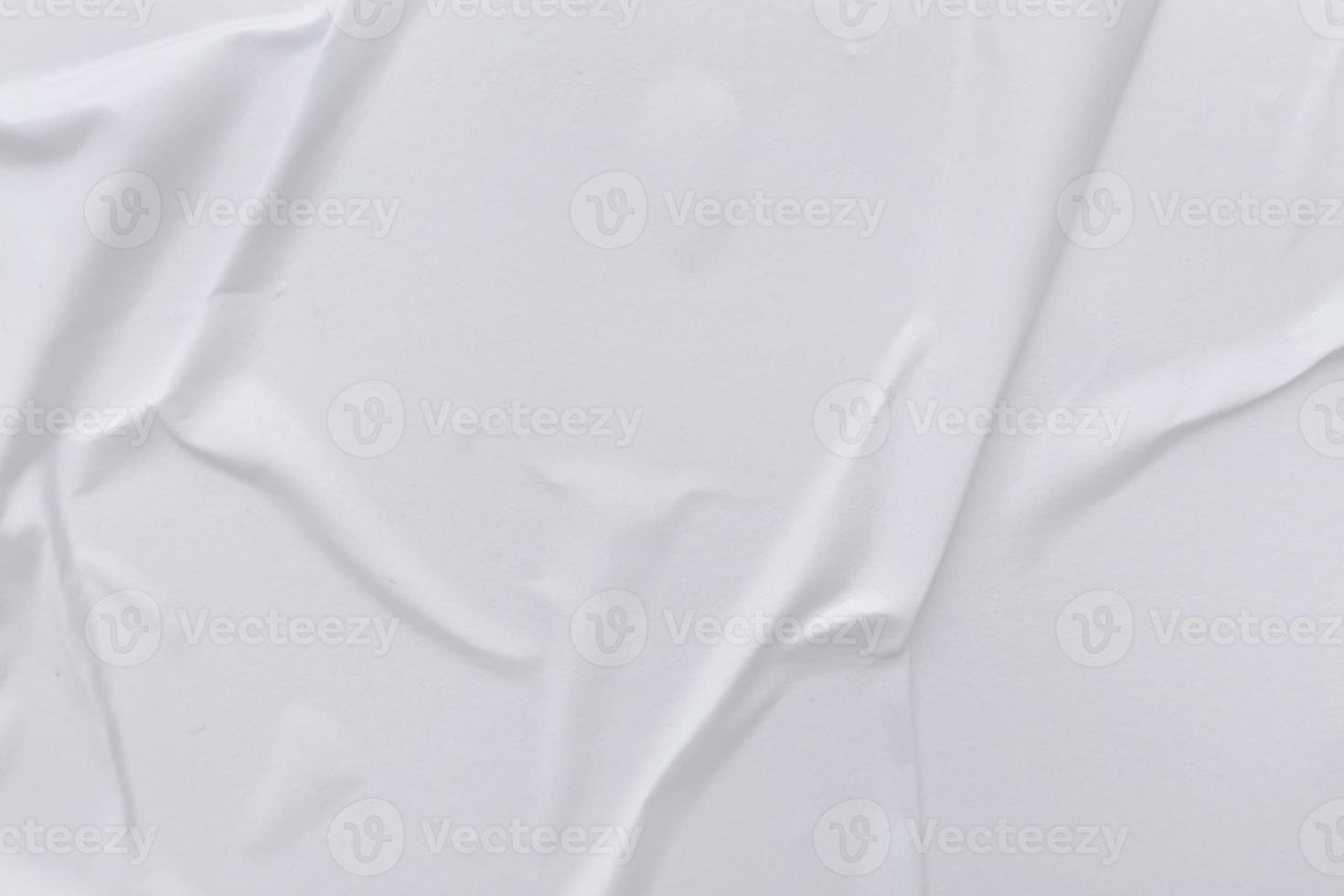 Blank white paper is crumpled texture background. Crumpled paper texture backgrounds for various purposes photo