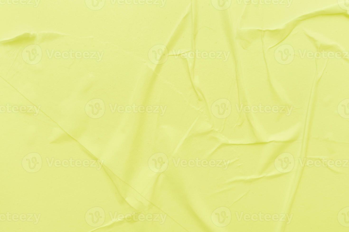 Blank yellow paper is crumpled texture background. Crumpled paper texture backgrounds for various purposes photo