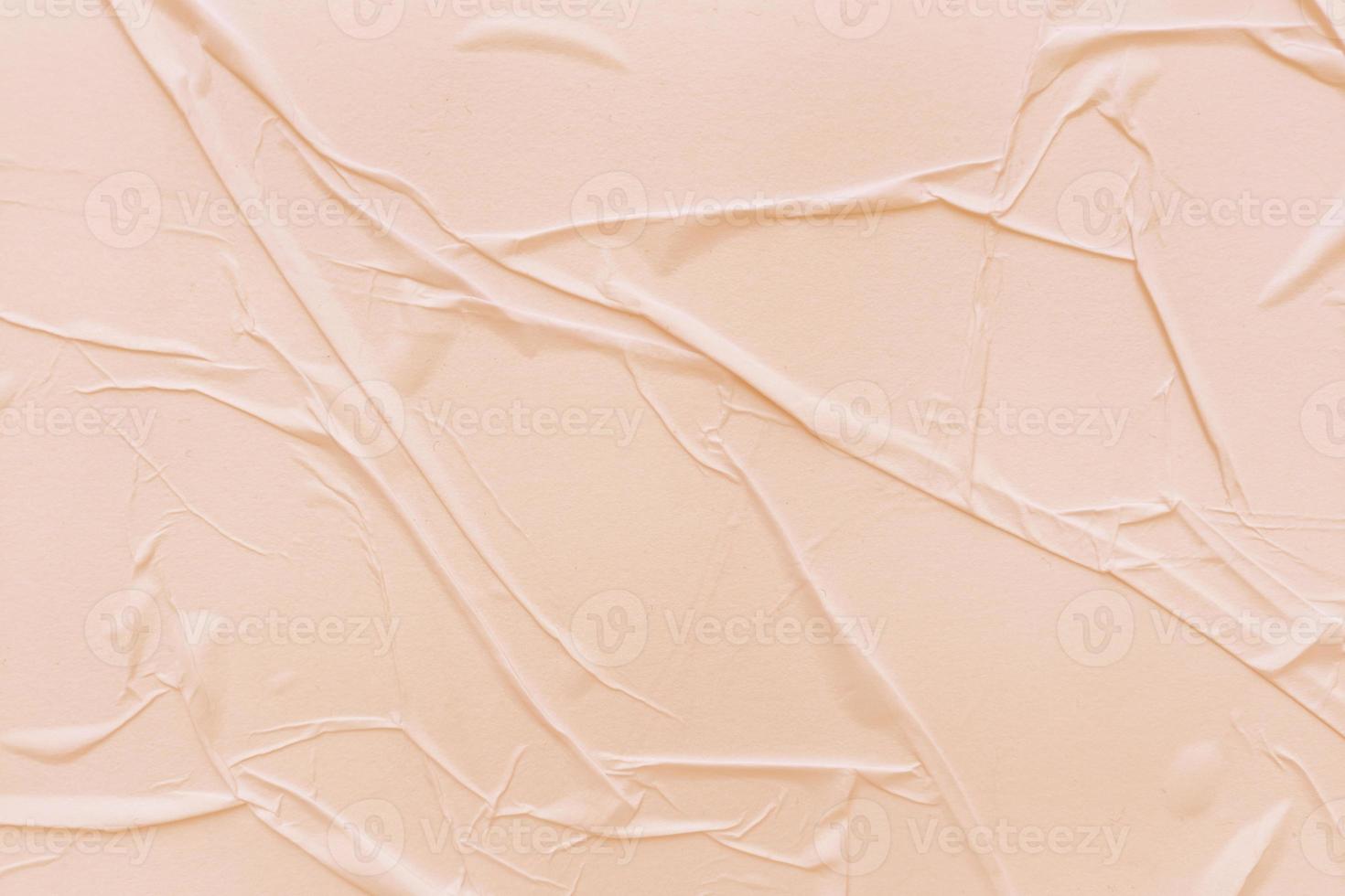 Blank cream paper is crumpled texture background. Crumpled paper texture backgrounds for various purposes photo