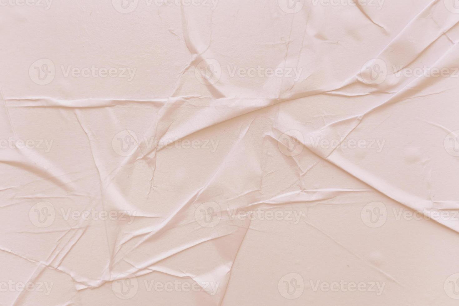 Blank cream paper is crumpled texture background. Crumpled paper texture backgrounds for various purposes photo