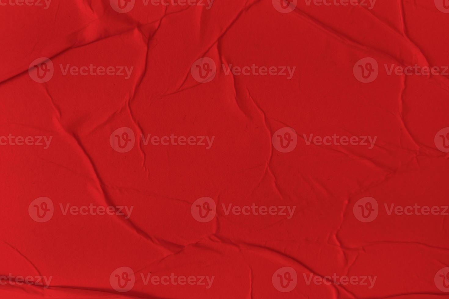 Blank red paper is crumpled texture background. Crumpled paper texture backgrounds for various purposes photo