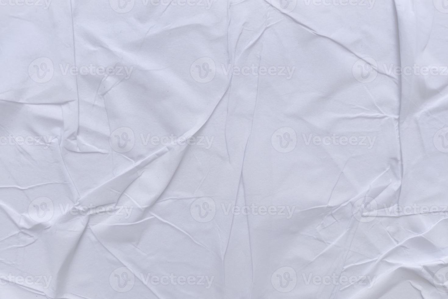 Blank white paper is crumpled texture background. Crumpled paper texture backgrounds for various purposes photo